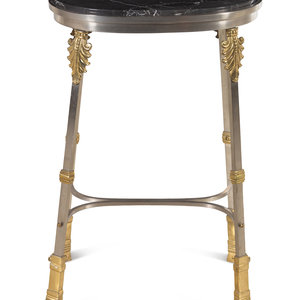 Appraisal: A French Steel and Brass Marble-Top Table in the Style