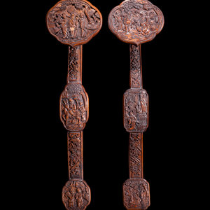 Appraisal: Two Chinese Carved Hardwood Ruyi Scepters each carved in low