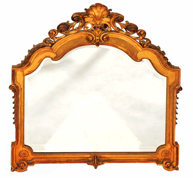 Appraisal: A GEORGIAN STYLE CARVED GILTWOOD OVERMANTLE MIRROR with shell and