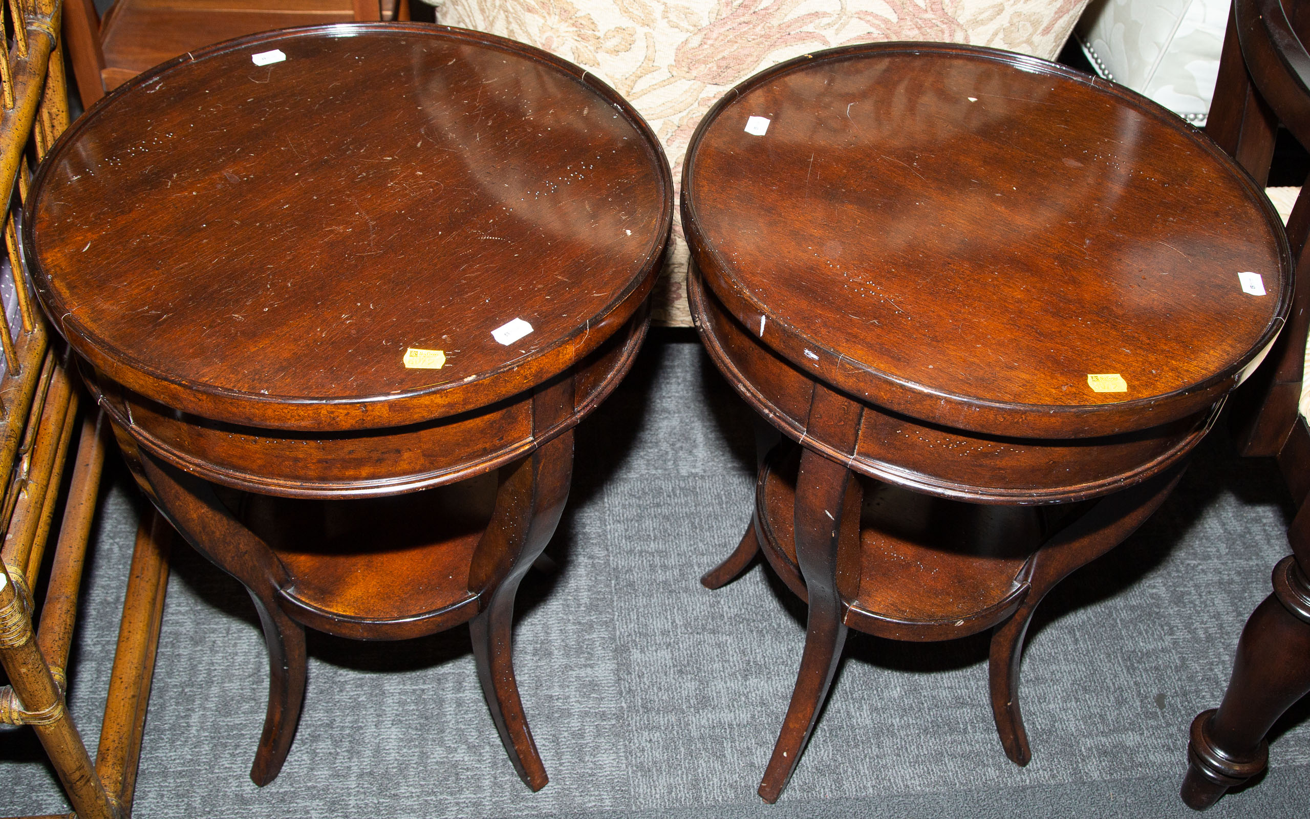 Appraisal: A PAIR OF ART DECO STYLE MAHOGANY LAMP TABLES Later