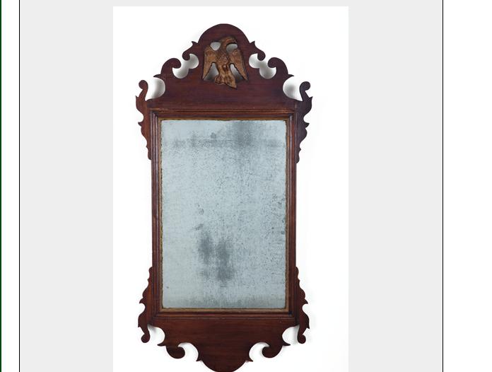 Appraisal: CHIPPENDALE MIRROR WITH SHAPED CREST AND APRON The scroll carved