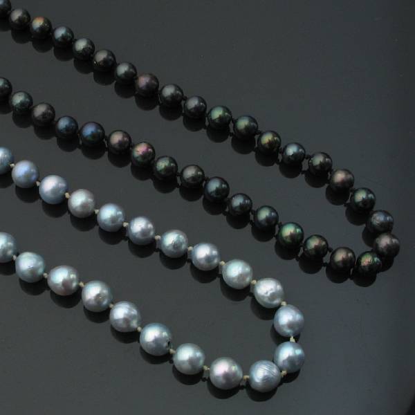 Appraisal: A collection of two strands of colored cultured pearl necklaces