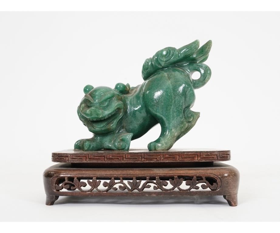 Appraisal: Chinese carved jade Foo Dog mounted on a wood base