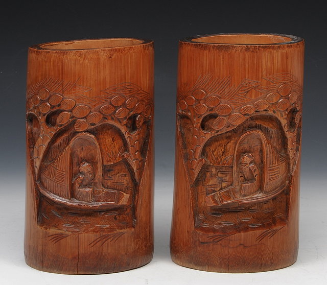 Appraisal: A PAIR OF CHINESE CARVED BAMBOO CYLINDRICAL BRUSH POTS circa