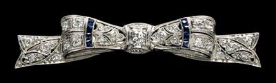 Appraisal: Vintage platinum ribbon brooch round full-cut diamonds estimated total weight