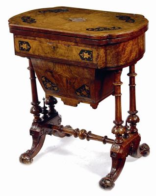 Appraisal: A Victorian walnut and marquetry games table the hinged swivel