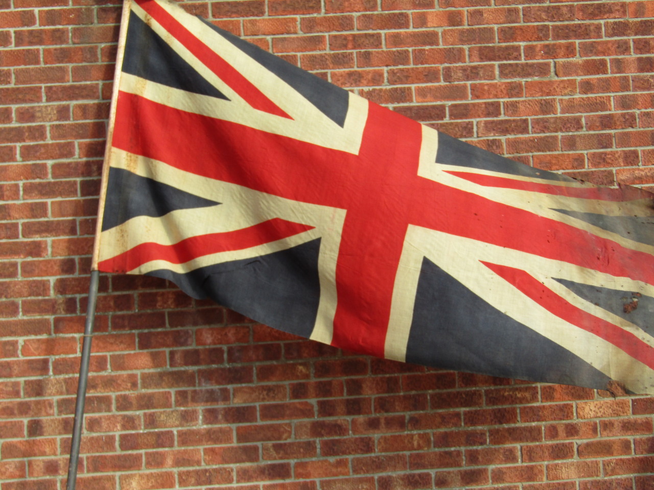 Appraisal: A large early thC Union Jack flag and flagpole the