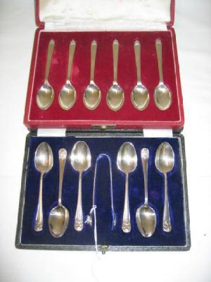 Appraisal: A CASED SET OF SIX TEASPOONS and matching sugar tongs