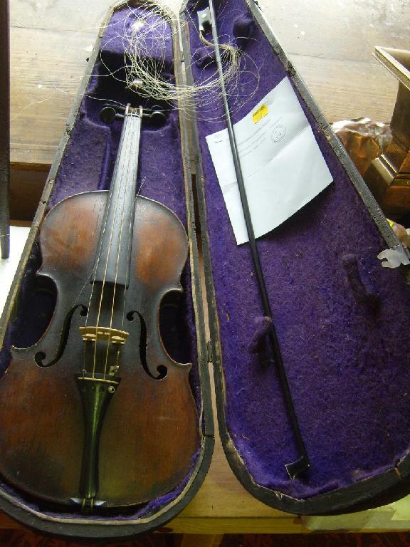 Appraisal: A cased violin with Stradivarius label verso together with bow