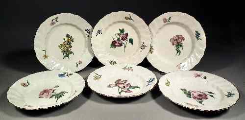 Appraisal: Six th century Tournay porcelain botanical plates painted in overglaze