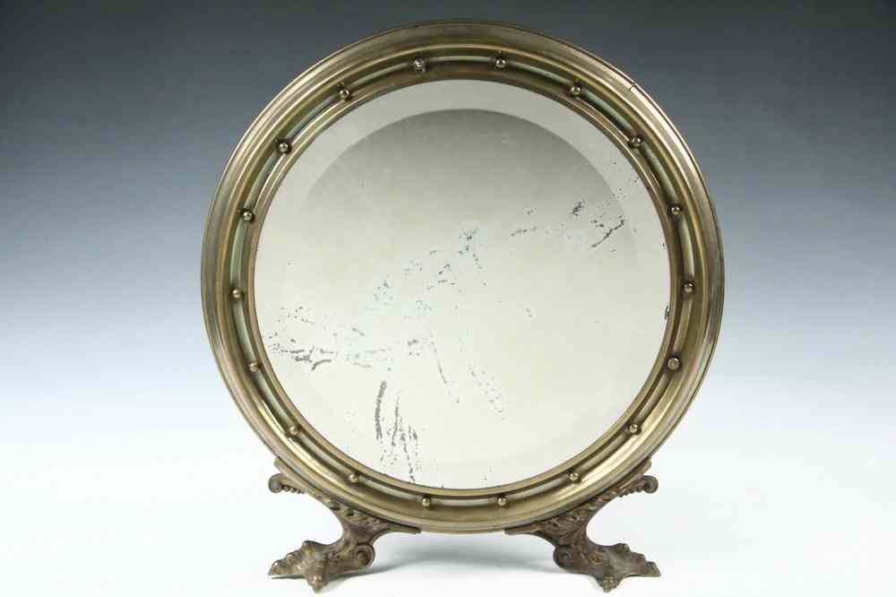 Appraisal: BRASS FRAMED MIRROR - th c Porthole form Dresser Mirror