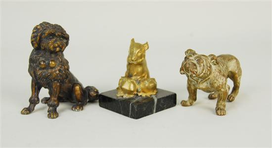 Appraisal: THREE SMALL CONTINENTAL ANIMAL FORM BRONZES depicting dogs and one