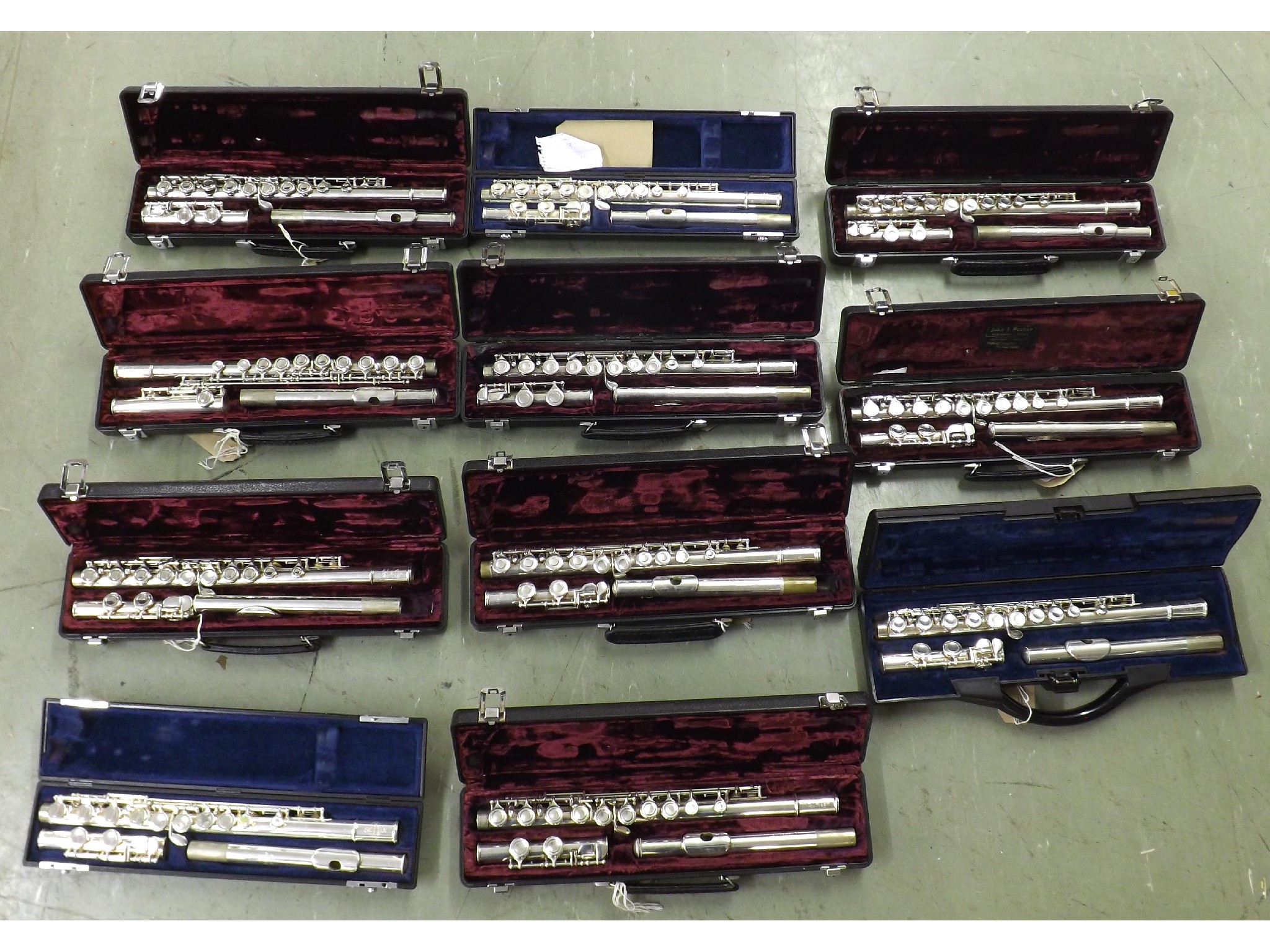 Appraisal: Nine Buffet Crampon metal flutes all cased together with two