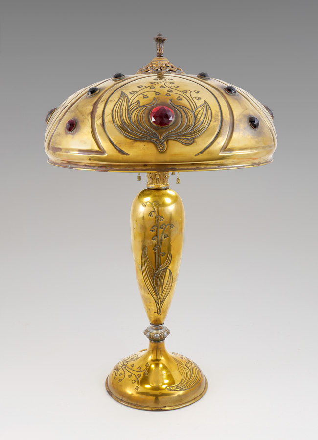 Appraisal: ART NOUVEAU BRASS JEWELED TABLE LAMP Embossed brass body with