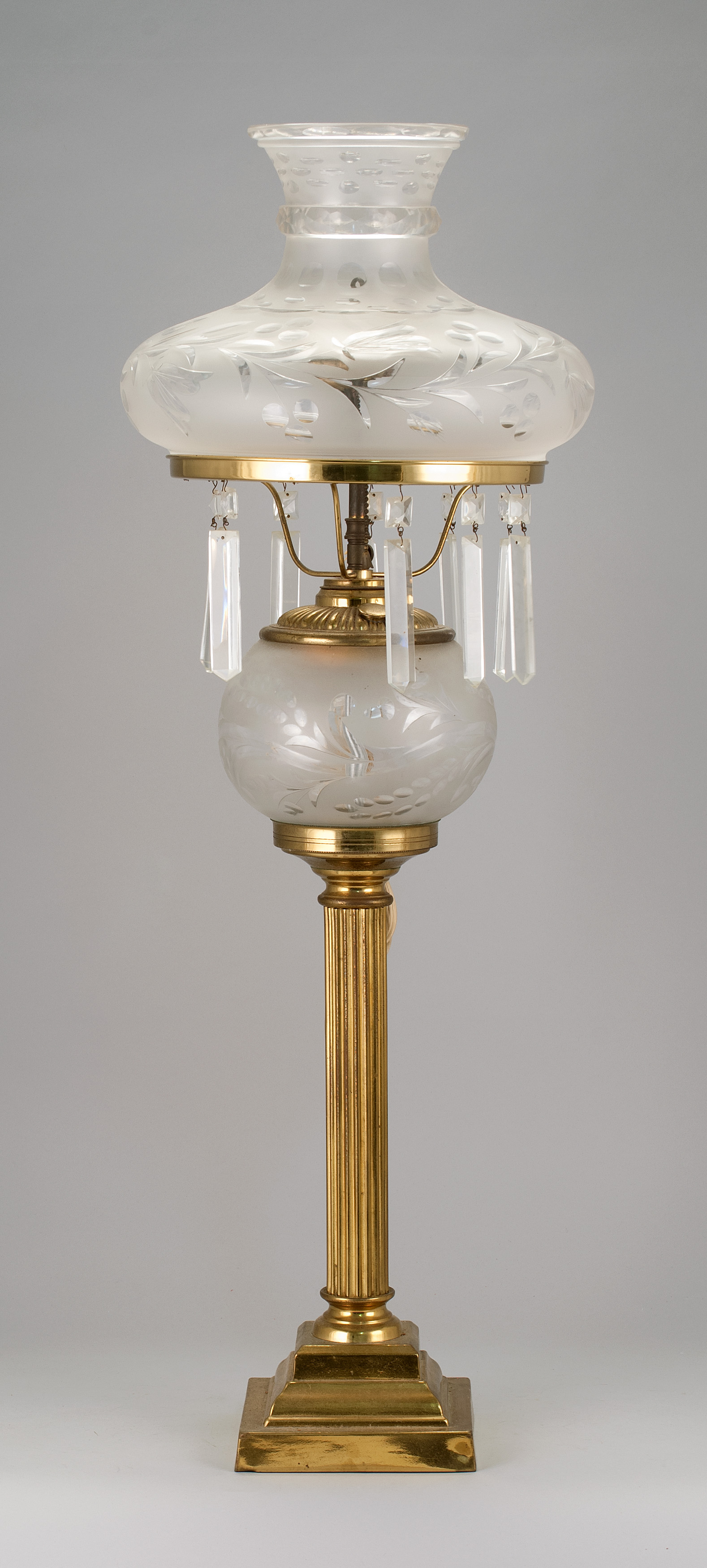 Appraisal: BRASS BANQUET LAMP Early th CenturyWith frosted and cut glass