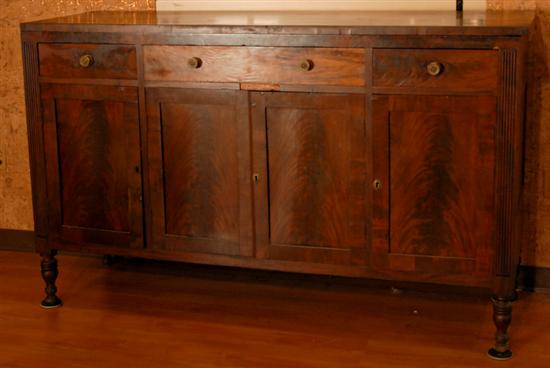 Appraisal: An E th C Sheraton Mahogany Sideboard the slightly overhanging