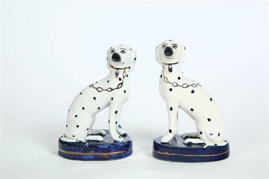 Appraisal: PAIR OF STAFFORDSHIRE DALMATIANS Facing dogs on cobalt bases with