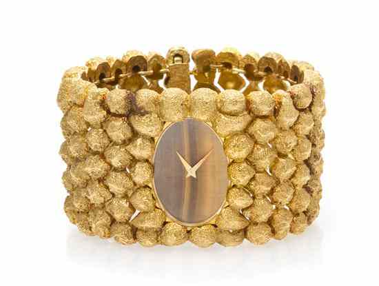 Appraisal: An Karat Yellow Gold and Tiger's Eye Quartz Wristwatch Piaget