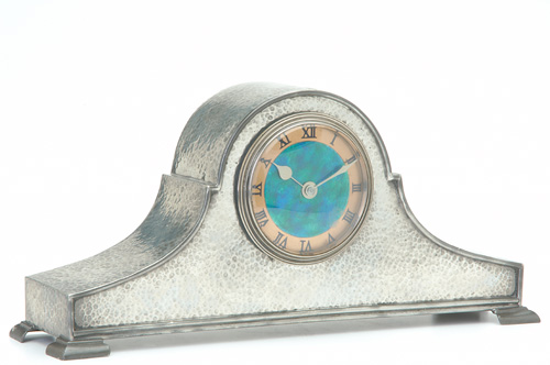 Appraisal: LIBERTY Tudric hammered pewter mantle clock with enameled face in