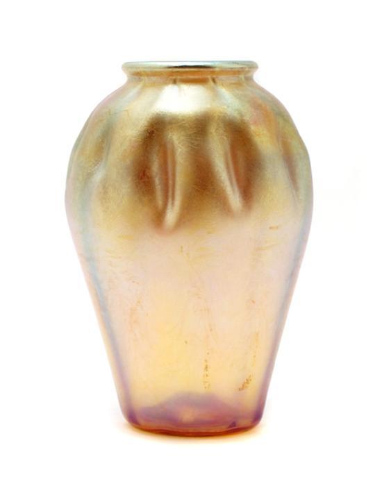 Appraisal: A Tiffany Favrile Glass Vase of ovoid form with dimpled