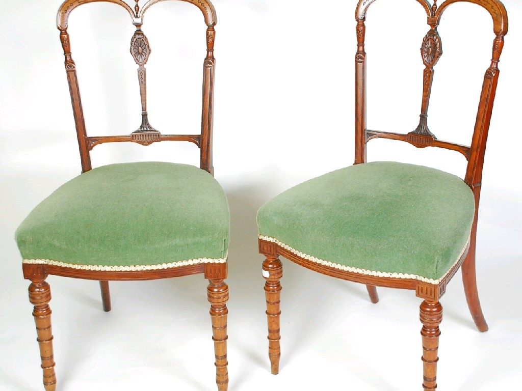 Appraisal: SET OF FOUR LATE VICTORIAN CARVED WALNUT SINGLE CHAIRS THE