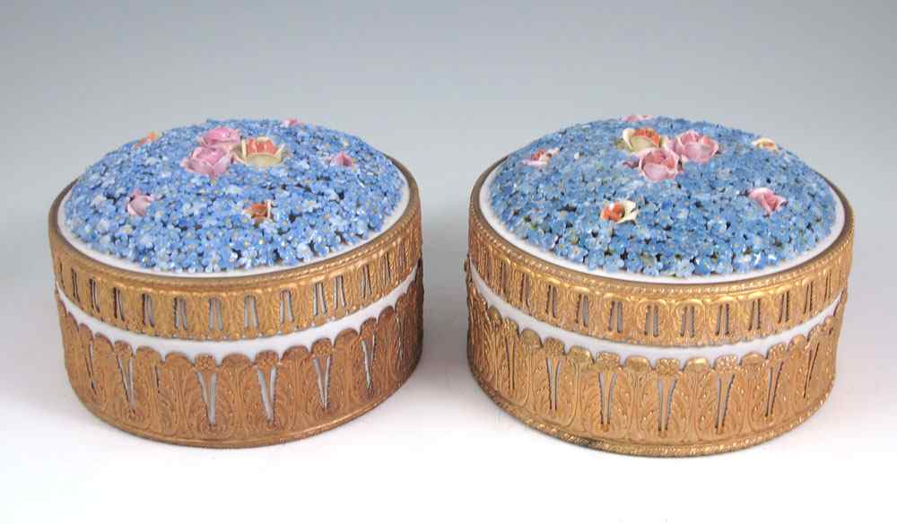 Appraisal: PAIR MEISSEN PORCELAIN DRESSER BOXES Gilt metal mounted covered boxes