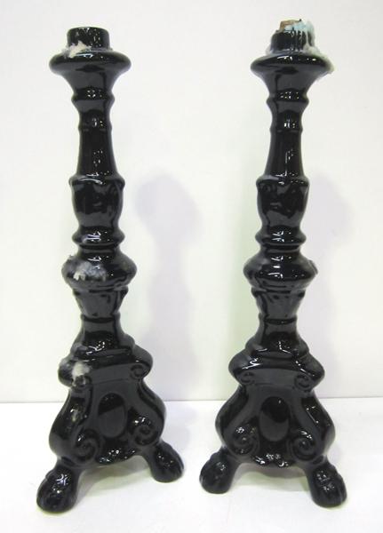 Appraisal: A PAIR OF BLACK PORCELAIN CANDLE STICKS A PAIR OF