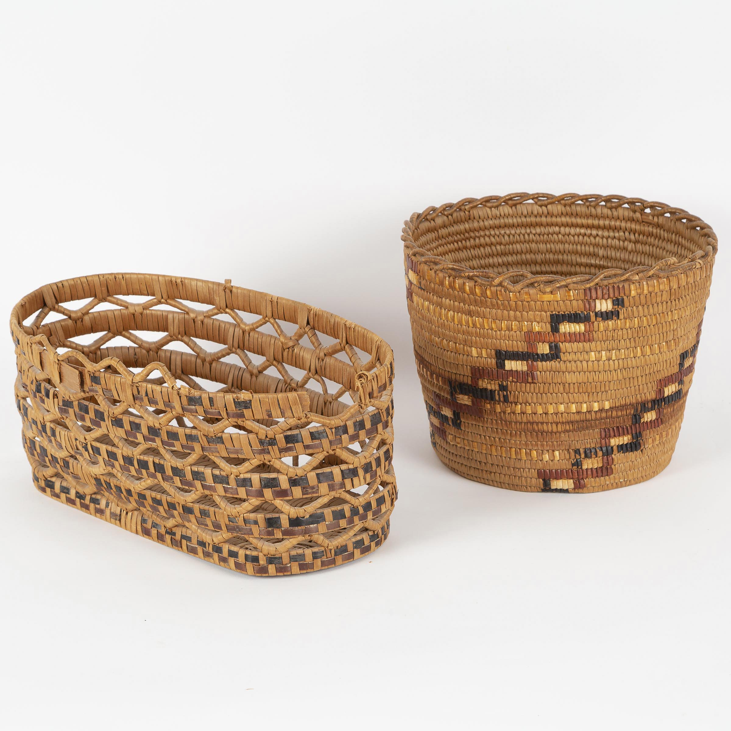 Appraisal: UNIDENTIFIED ARTIST TWO SALISH BASKETS one oval with an openwork