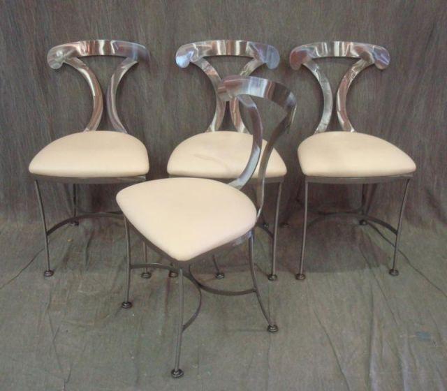 Appraisal: Neoclassical Style Steel Chairs Great looking with white leather upholstery