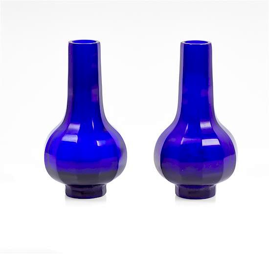 Appraisal: A Pair of Cobalt-Blue Glass Faceted Bottle Vases Height inches