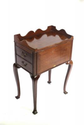 Appraisal: A George III mahogany bedside table with galleried top adjustable