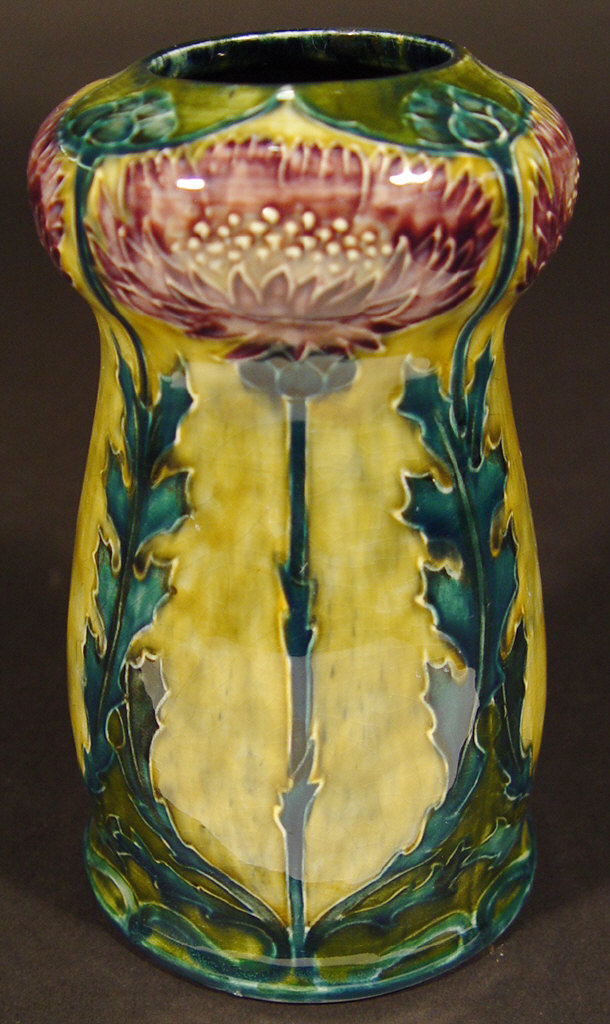 Appraisal: Morrisware pottery vase hand painted and tubelined with thistles onto