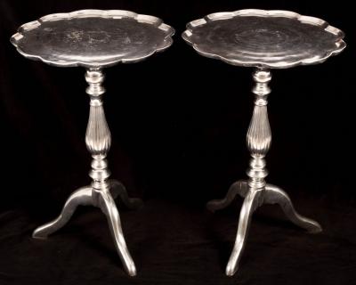 Appraisal: A pair of metal tripod tables with lobed tops cm