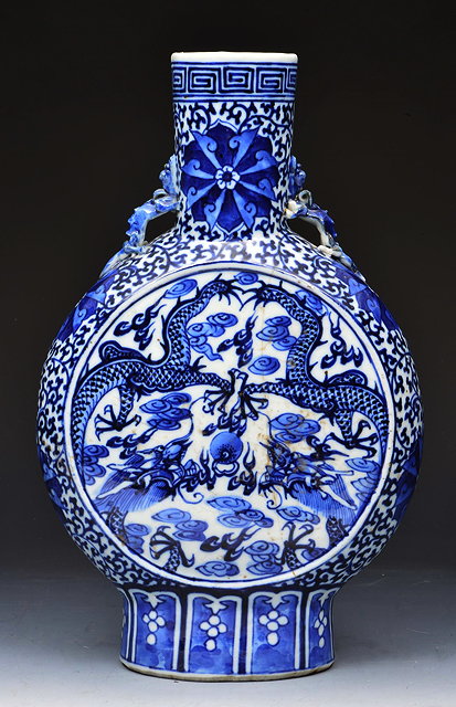 Appraisal: A CHINESE BLUE AND WHITE PORCELAIN MOON FLASK with stylised