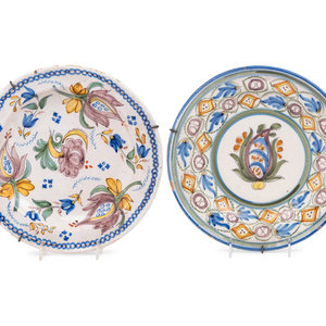 Appraisal: Two Continental Fa ence Plates Late th Early th Century