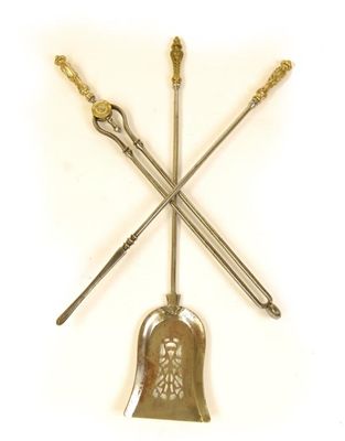 Appraisal: A pair of th century polished steel fire tongs with