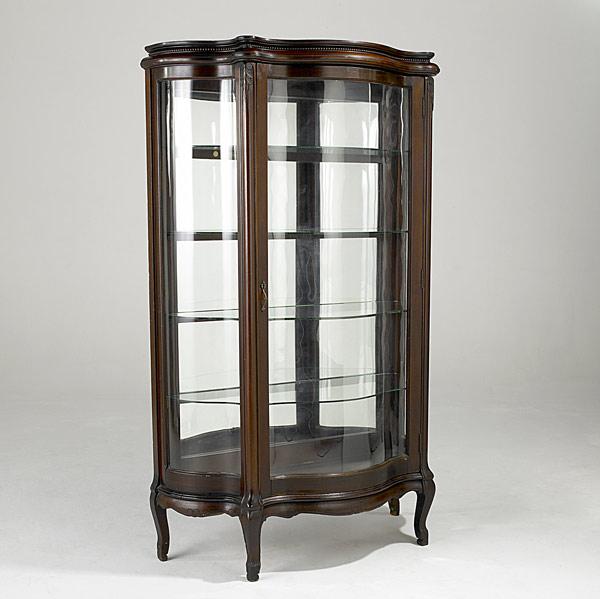 Appraisal: CHINA CABINET Mahogany with serpentine glass front and four glass