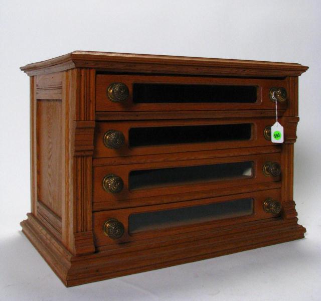 Appraisal: Antique Four-Drawer Spool Cabinet ash cabinet with clear glass drawer