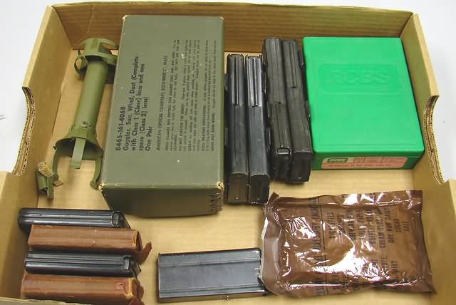 Appraisal: Lot of M carbine magazines US goggles grenade adaptor and