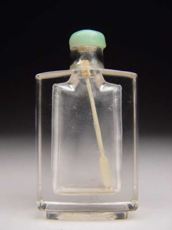 Appraisal: ANTIQUE ROCK CRYSTAL SNUFF BOTTLE Antique carved rock crystal snuff