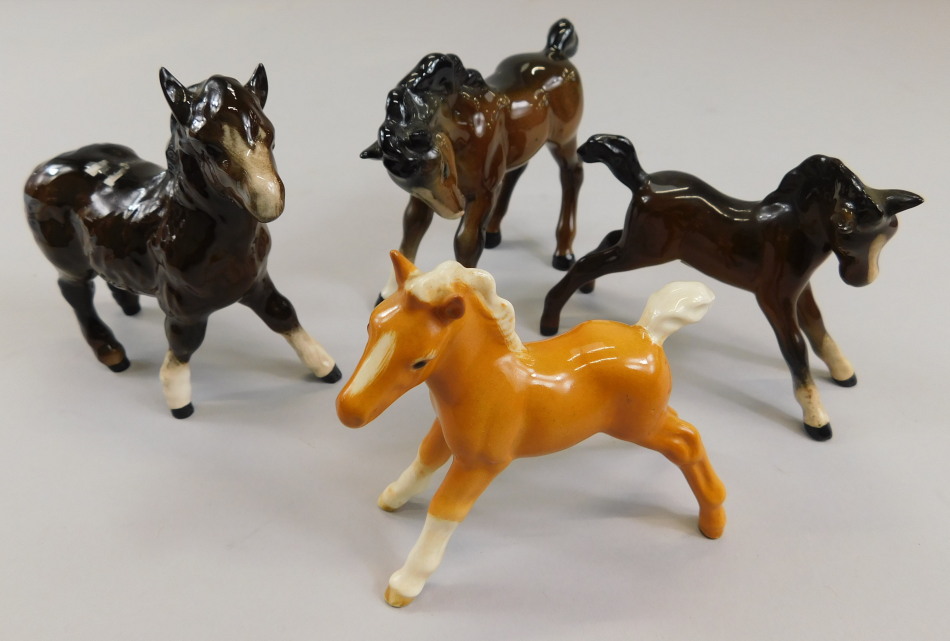 Appraisal: Four Beswick foals to include three brown and one tan