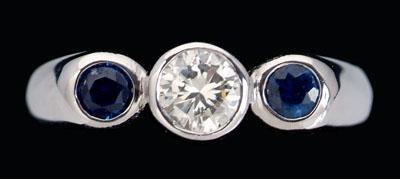 Appraisal: Diamond sapphire ring central round brilliant-cut diamond estimated weight cts