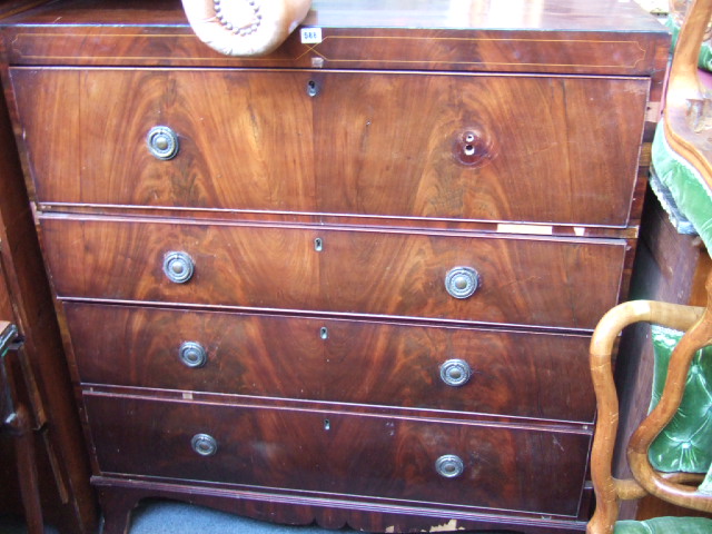 Appraisal: A George III mahogany secretaire chest the dummy drop down