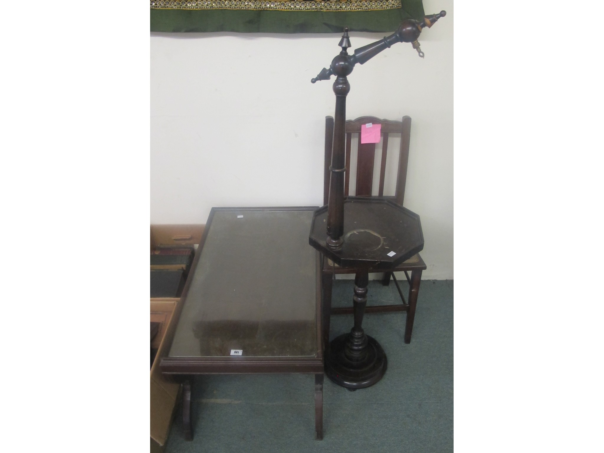 Appraisal: A mahogany glass top low table reading lamp and another