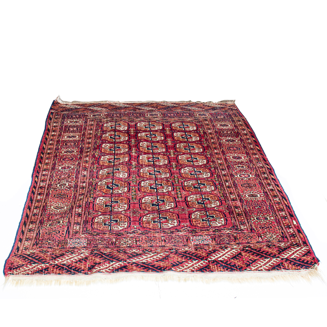 Appraisal: A TURKOMAN BOKHARA CARPET A Turkoman Bokhara carpet ' x