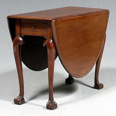 Appraisal: Chippendale mahogany drop leaf table oval top with two drop