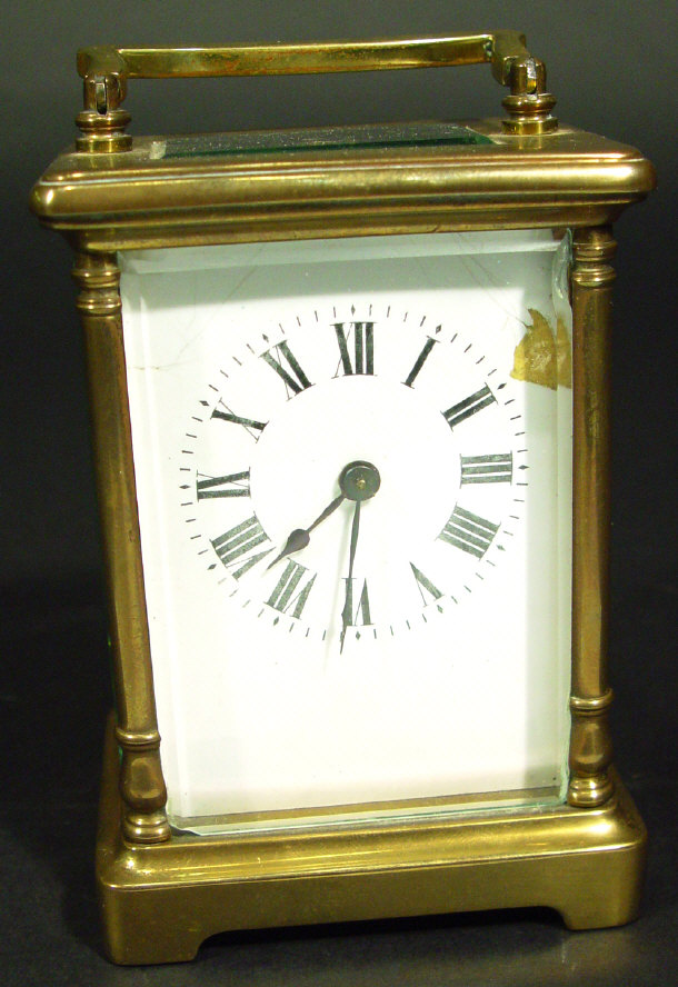 Appraisal: Victorian brass carriage clock with bevelled glass panels the enamel