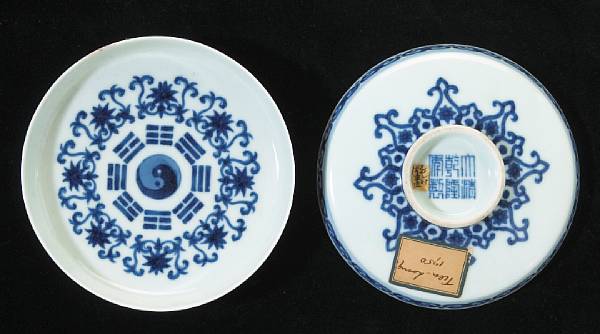 Appraisal: A pair of blue and white porcelain cup stands Qianlong