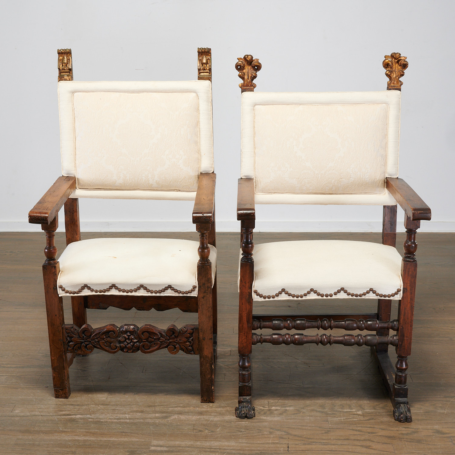 Appraisal: ANTIQUE SPANISH BAROQUE STYLE ARMCHAIRS th c carved walnut having