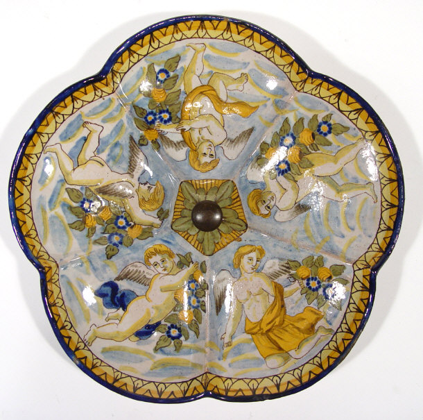 Appraisal: Faience glazed Continental pottery hors-d'oeuvre dish hand painted with cherubs